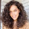 Layered Curly Medium Length Hairstyles (Photo 4 of 25)