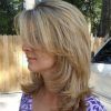 Medium Hairstyles With Perky Feathery Layers (Photo 15 of 25)