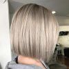 Dynamic Tousled Blonde Bob Hairstyles With Dark Underlayer (Photo 19 of 25)