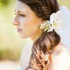 Curly Wedding Hairstyles With An Orchid (Photo 17 of 25)