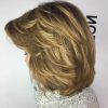 Curly Lob Haircuts With Feathered Ends (Photo 8 of 25)