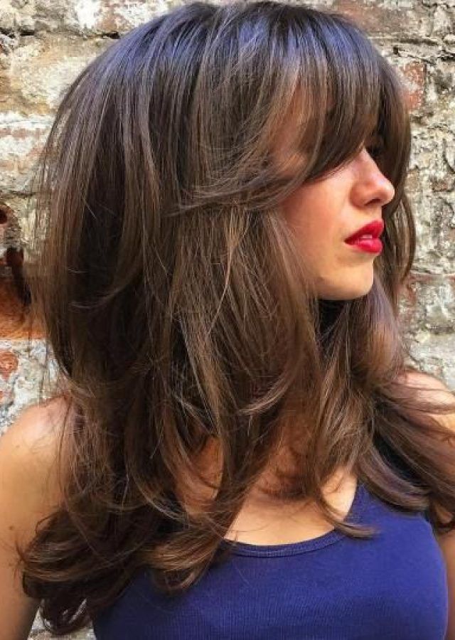 The Best Long Haircuts Layered with Bangs