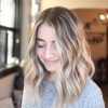 Sun-Kissed Blonde Hairstyles With Sweeping Layers (Photo 7 of 25)