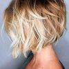 Short Asymmetric Bob Hairstyles With Textured Curls (Photo 10 of 25)