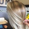 Sun-Kissed Blonde Hairstyles With Sweeping Layers (Photo 12 of 25)