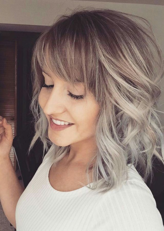 2024 Best of Curly Ash Blonde Updo Hairstyles with Bouffant and Bangs