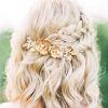 Sleek Bridal Hairstyles With Floral Barrette (Photo 12 of 25)