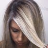 Dark Roots And Icy Cool Ends Blonde Hairstyles (Photo 12 of 25)