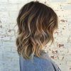 Short Bob Hairstyles With Whipped Curls And Babylights (Photo 11 of 25)