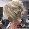 Curly Angled Blonde Bob Hairstyles (Photo 10 of 25)