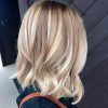 Angled Wavy Lob Blonde Hairstyles (Photo 7 of 25)