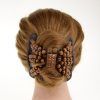 Side Bun Prom Hairstyles With Jewelled Barrettes (Photo 21 of 25)