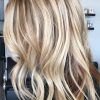 Dark Locks Blonde Hairstyles With Caramel Highlights (Photo 12 of 25)
