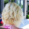 Curly Angled Blonde Bob Hairstyles (Photo 24 of 25)