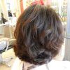 Nape-Length Brown Bob Hairstyles With Messy Curls (Photo 10 of 25)