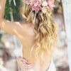 Bohemian Curls Bridal Hairstyles With Floral Clip (Photo 8 of 25)