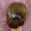 Chignon Wedding Hairstyles With Pinned Up Embellishment (Photo 21 of 25)