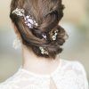 Chignon Wedding Hairstyles With Pinned Up Embellishment (Photo 24 of 25)