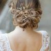 Pearl Bun Updo Hairstyles (Photo 9 of 25)