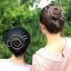 Bun Updo With Accessories For Thick Hair (Photo 23 of 25)