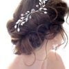 Side Bun Prom Hairstyles With Orchids (Photo 12 of 25)
