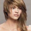 Asymmetrical Parting Feathered Fringe Hairstyles (Photo 24 of 25)