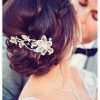 Curly Wedding Updos With Flower Barrette Ties (Photo 8 of 25)