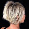 Dynamic Tousled Blonde Bob Hairstyles With Dark Underlayer (Photo 16 of 25)