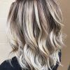 Pearl Blonde Bouncy Waves Hairstyles (Photo 3 of 25)
