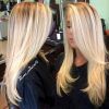 Pearl Blonde Bouncy Waves Hairstyles (Photo 16 of 25)