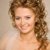 Curly Bridal Bun Hairstyles With Veil (Photo 3 of 25)