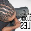 Tightly Coiled Gray Dreads Bun Hairstyles (Photo 12 of 25)