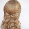 Twisted And Pinned Half Up Wedding Hairstyles (Photo 24 of 25)