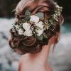 Undone Low Bun Bridal Hairstyles With Floral Headband (Photo 5 of 25)