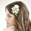 Curly Wedding Hairstyles With An Orchid (Photo 6 of 25)
