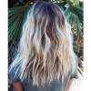 Salty Beach Blonde Layers Hairstyles (Photo 17 of 25)