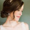 Undone Low Bun Bridal Hairstyles With Floral Headband (Photo 7 of 25)