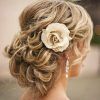 Curly Wedding Updos With Flower Barrette Ties (Photo 12 of 25)