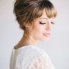 Bridal Mid-Bun Hairstyles With A Bouffant (Photo 1 of 25)
