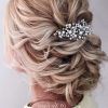Curly Wedding Updos With Flower Barrette Ties (Photo 2 of 25)