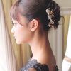 Bridal Mid-Bun Hairstyles With A Bouffant (Photo 4 of 25)