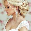 Curly Bridal Bun Hairstyles With Veil (Photo 11 of 25)