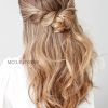 Twisted And Pinned Half Up Wedding Hairstyles (Photo 23 of 25)