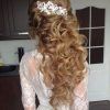 Half Up Wedding Hairstyles With Jeweled Clip (Photo 1 of 25)