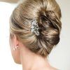 Voluminous Chignon Wedding Hairstyles With Twists (Photo 11 of 25)