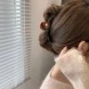 Bun Updo With Accessories For Thick Hair (Photo 19 of 25)