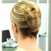 Sleek French Knot Hairstyles With Curls (Photo 10 of 25)
