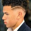 Mohawk Haircuts On Curls With Parting (Photo 19 of 25)