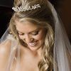 Long Curly Bridal Hairstyles With A Tiara (Photo 22 of 25)