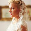 Side Curls Bridal Hairstyles With Tiara And Lace Veil (Photo 23 of 25)